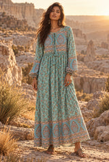 Desert Heirloom turquoise floral long-sleeve maxi gown, AI-generated model, editorial hero