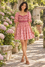 Meadow Serenade pink floral mini dress, AI-generated model, editorial hero