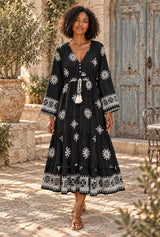 Starlit Nomad black floral maxi dress, AI-generated model, editorial hero