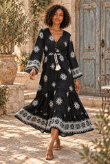 Starlit Nomad black floral maxi dress, AI-generated model, editorial movement