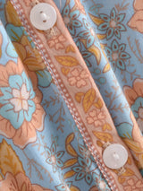 Boho Mini Dress – “Apricot Sky” Light Blue Floral Long Sleeve Tie-Neck Dress
