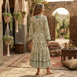 Bohemian Maxi Gown – “Starlit Nomad” Floral Long Sleeve Tassel Dress