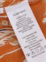 Saffron Meadow rust floral pants garment detail