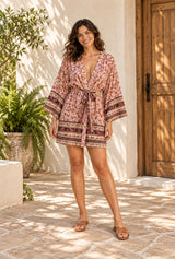 Boho Short Robe – “Rosewood Escape” Pink Floral Kimono Beach Cover-Up — styled on an AI-generated model