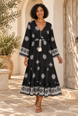 Bohemian Maxi Gown – “Starlit Nomad” Floral Long Sleeve Tassel Dress — styled on an AI-generated model