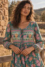 Emerald Wildflower green floral maxi dress neckline and print detail with AI-generated adult model