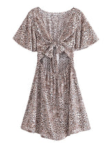 Boho Mini Dress – “Wildflower Waltz” Floral & Leopard Bow-Front Cutout Dress