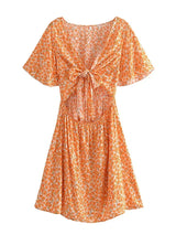 Boho Mini Dress – “Wildflower Waltz” Floral & Leopard Bow-Front Cutout Dress