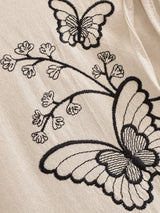 Bohemian Maxi Dress – “Botanical Muse” Butterfly Embroidered Long Sleeve Tie-Neck Dress