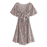 Boho Mini Dress – “Wildflower Waltz” Floral & Leopard Bow-Front Cutout Dress