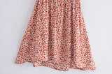 Boho Mini Dress – “Wildflower Waltz” Floral & Leopard Bow-Front Cutout Dress