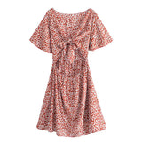 Boho Mini Dress – “Wildflower Waltz” Floral & Leopard Bow-Front Cutout Dress