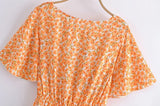 Boho Mini Dress – “Wildflower Waltz” Floral & Leopard Bow-Front Cutout Dress