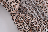 Boho Mini Dress – “Wildflower Waltz” Floral & Leopard Bow-Front Cutout Dress