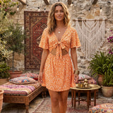 Boho Mini Dress – “Wildflower Waltz” Floral & Leopard Bow-Front Cutout Dress