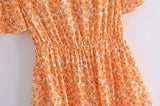 Boho Mini Dress – “Wildflower Waltz” Floral & Leopard Bow-Front Cutout Dress