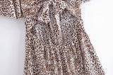 Boho Mini Dress – “Wildflower Waltz” Floral & Leopard Bow-Front Cutout Dress