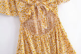 Boho Mini Dress – “Wildflower Waltz” Floral & Leopard Bow-Front Cutout Dress