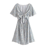 Boho Mini Dress – “Wildflower Waltz” Floral & Leopard Bow-Front Cutout Dress