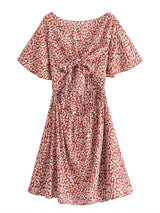 Boho Mini Dress – “Wildflower Waltz” Floral & Leopard Bow-Front Cutout Dress