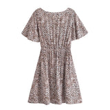 Boho Mini Dress – “Wildflower Waltz” Floral & Leopard Bow-Front Cutout Dress