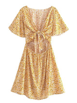 Boho Mini Dress – “Wildflower Waltz” Floral & Leopard Bow-Front Cutout Dress