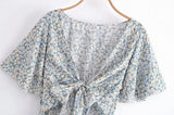 Boho Mini Dress – “Wildflower Waltz” Floral & Leopard Bow-Front Cutout Dress