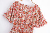 Boho Mini Dress – “Wildflower Waltz” Floral & Leopard Bow-Front Cutout Dress