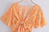 Boho Mini Dress – “Wildflower Waltz” Floral & Leopard Bow-Front Cutout Dress