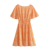 Boho Mini Dress – “Wildflower Waltz” Floral & Leopard Bow-Front Cutout Dress