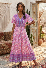 Purple and pink floral V-neck maxi dress with short sleeves, front view