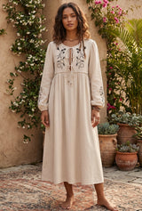 Meadow Stitch beige maxi dress with black floral embroidery, front view