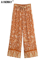 Saffron Meadow rust floral pants garment detail