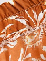 Saffron Meadow rust floral pants garment detail