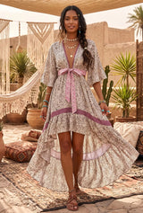 Savanna Rose leopard print high-low bohemian dress with tie waist