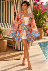 Sunset Bloom floral cover-up editorial movement