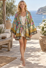 Boho Short Robe – “Irma” Peacock in Gold Green Kimono Beach Cover-Up for Women — AI-generated editorial model image