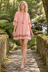 Wild Rose Boho AI editorial movement, Boho Mini Dress – “Blush Botanica” Pink Floral Embroidered Tassel-Tie Dress, pink colorway