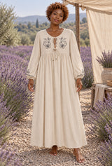 Wild Rose Boho AI editorial full-body hero, Bohemian Maxi Dress – “Botanical Muse” Butterfly Embroidered Long Sleeve Tie-Neck Dress, beige colorway