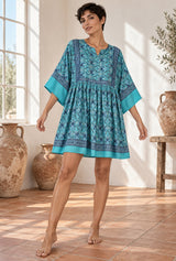 Wild Rose Boho AI editorial full-body hero, Boho Mini Dress – “Turquoise Reverie” Paisley Batwing Sleeve Loose Dress, green colorway
